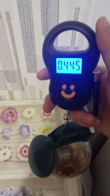 rubber handle Hook Smile Face - Portable-Luggage-Scales weighing scale available in Kampala, Uganda